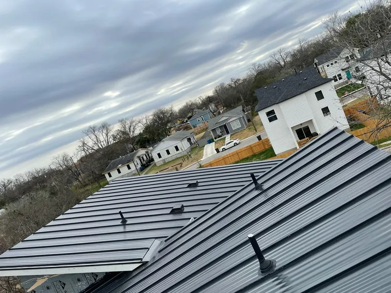 Standing seam metal roof panels with vents for Skylight Repair in Heber